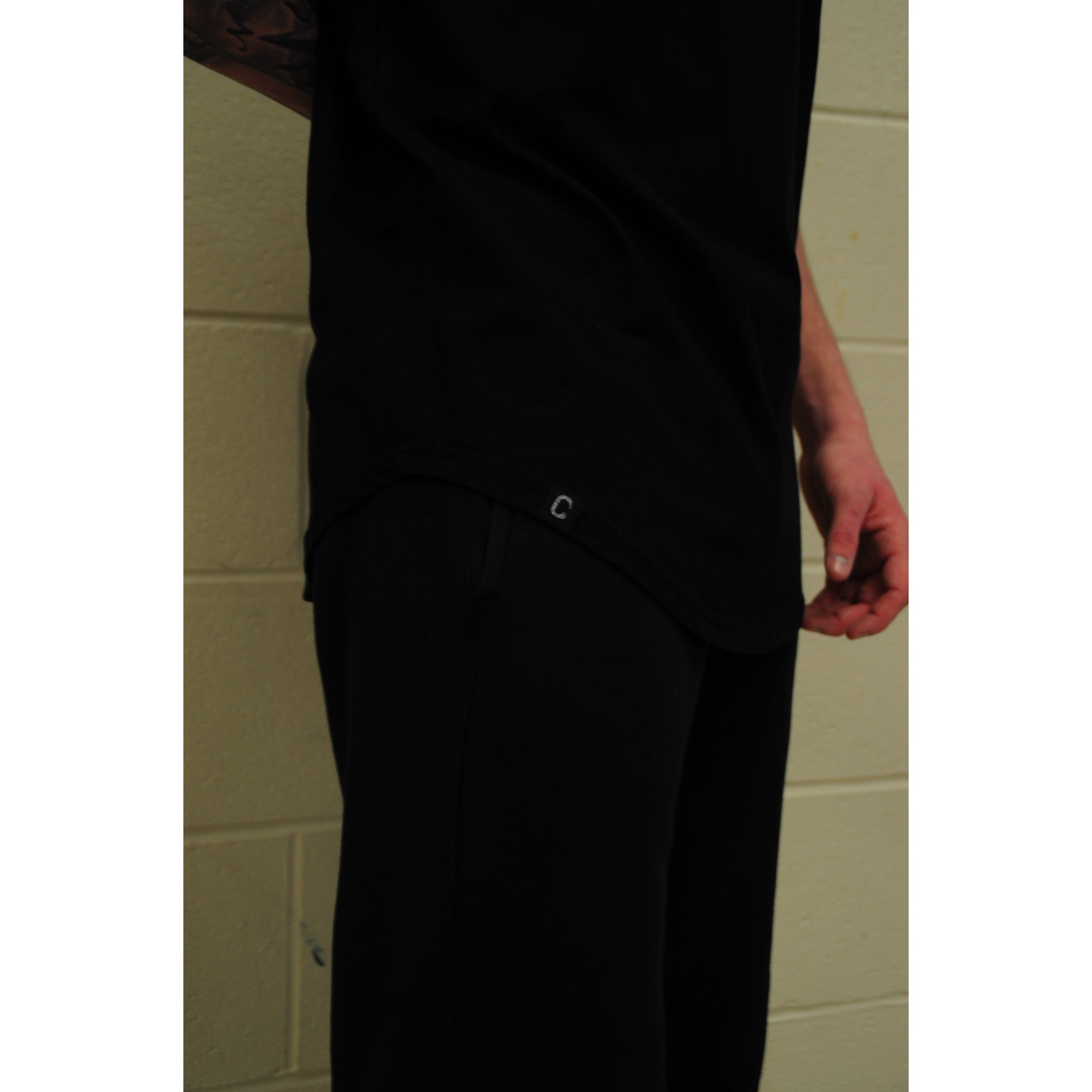 The Closet Inc Men Curved Hem T-Shirts “Black" Property Of"