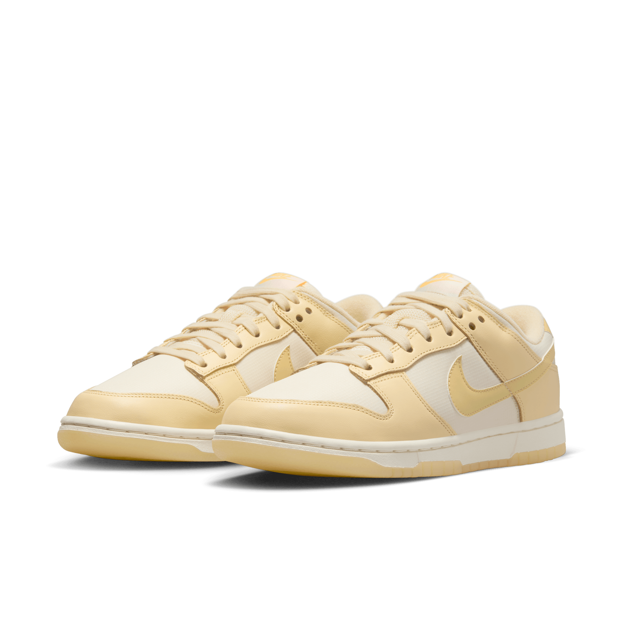 Nike Women s Dunk Low Muslin Team Gold Sneakers