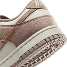 Women's Nike Dunk Low "Malt Gold Mini Swoosh"