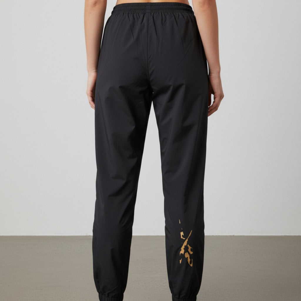 Women's Reebok Apparel Animal Print Vector Track