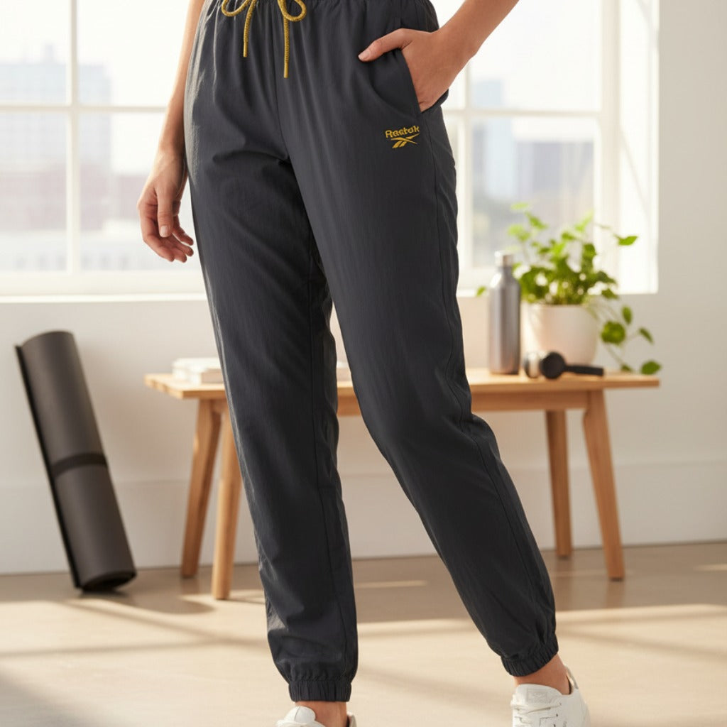 Women's Reebok Apparel Animal Print Vector Track